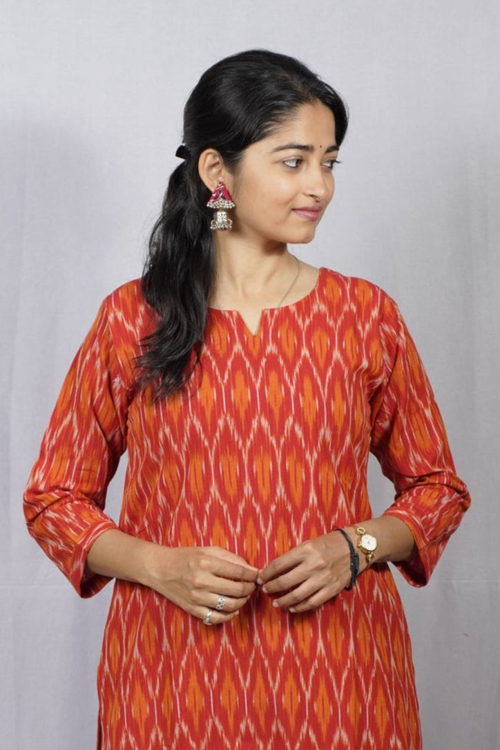 Saisha Orange Ikkat Cotton Straight Kurta – elegant ethnic wear for women, available for online shopping