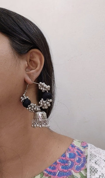 black hoop earrings      